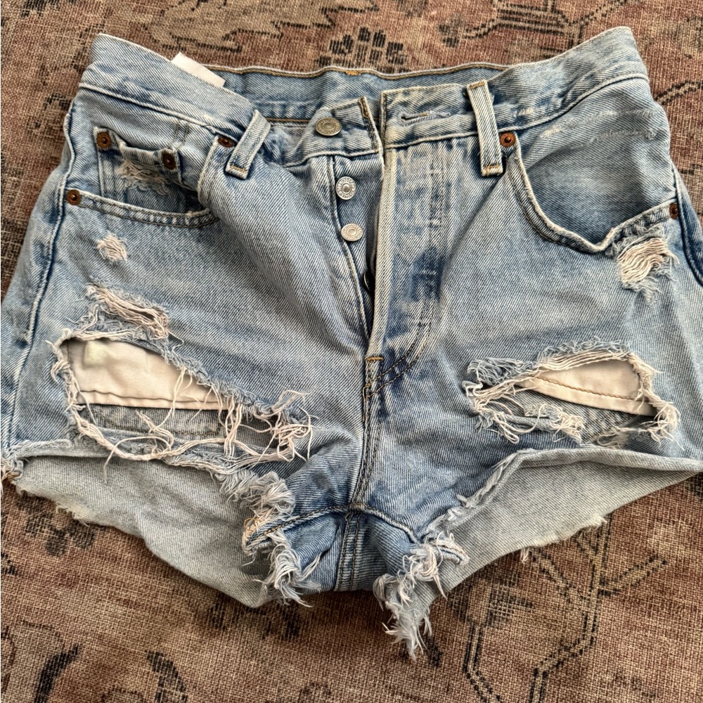 Levi’s Distressed Light Blue Denim Shorts